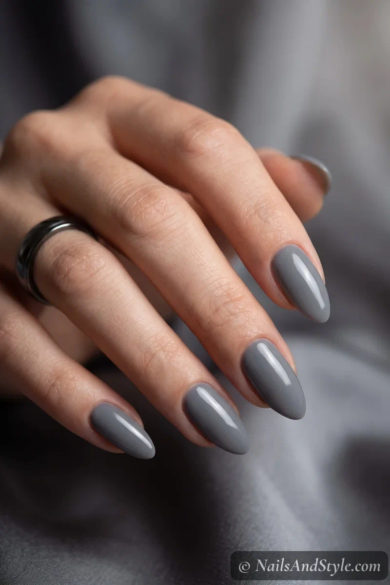 Almond nails in a moody smoky grey