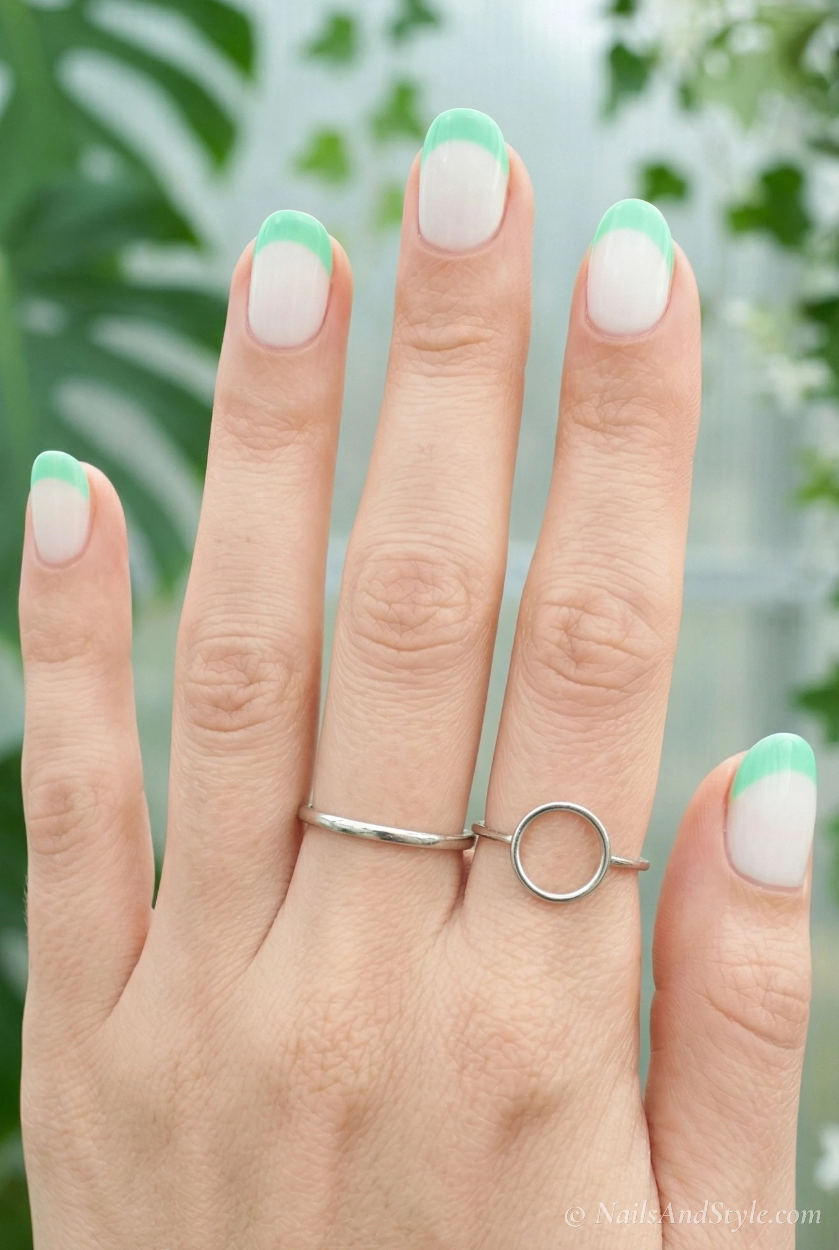 Mint green French tip nails