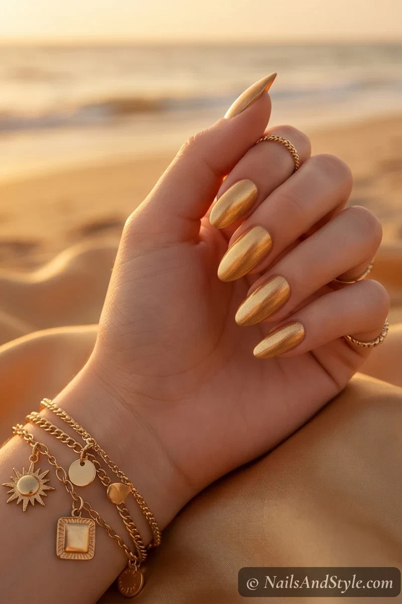 Warm gold metallic shimmer nails with smooth buttery finish