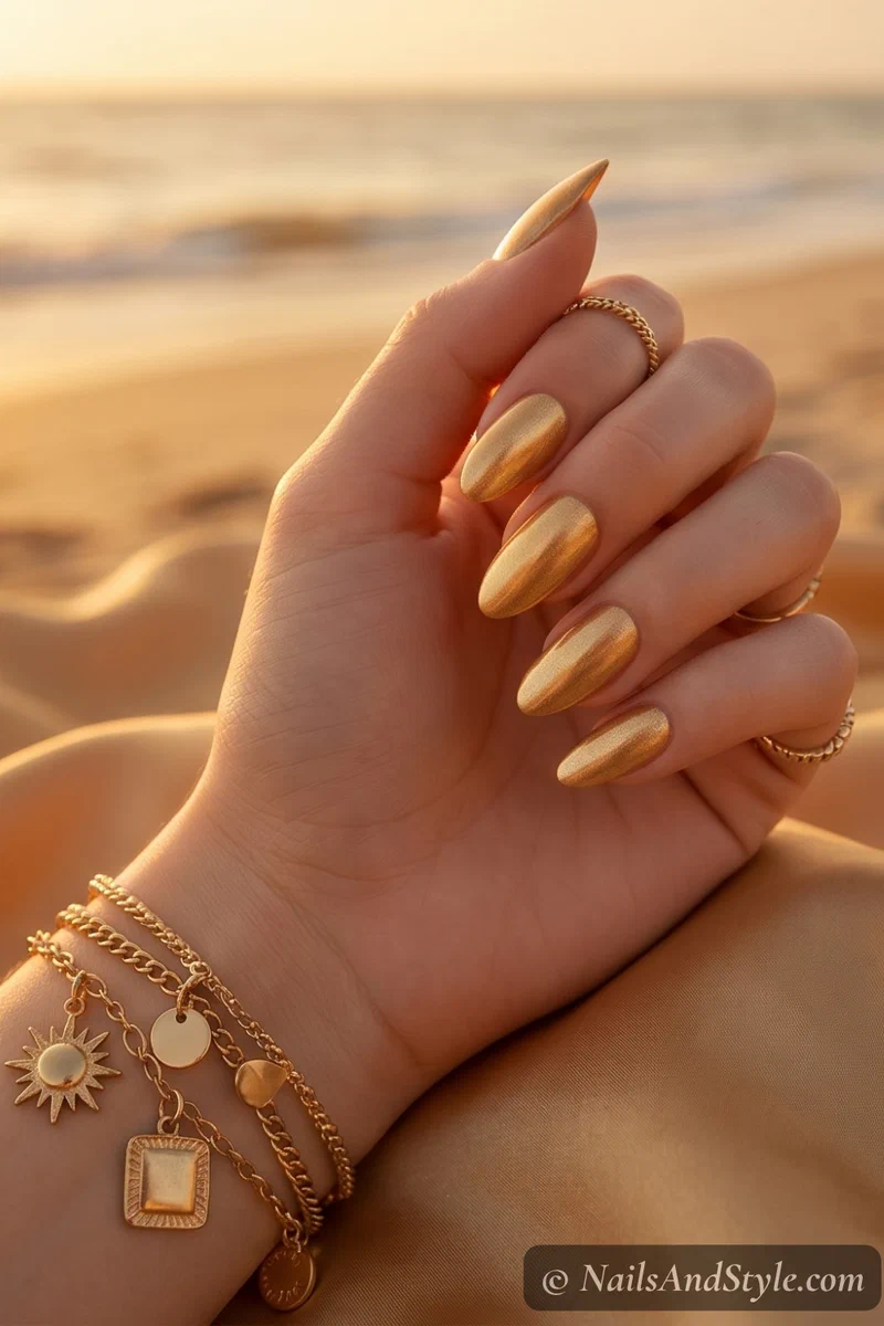 Warm gold metallic shimmer nails with smooth buttery finish