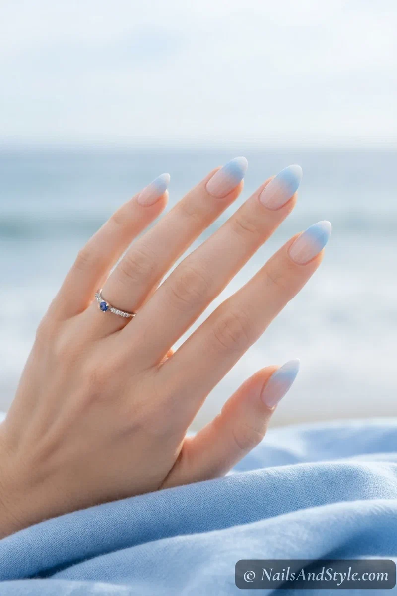 Soft blue to white ombre French bridal nails