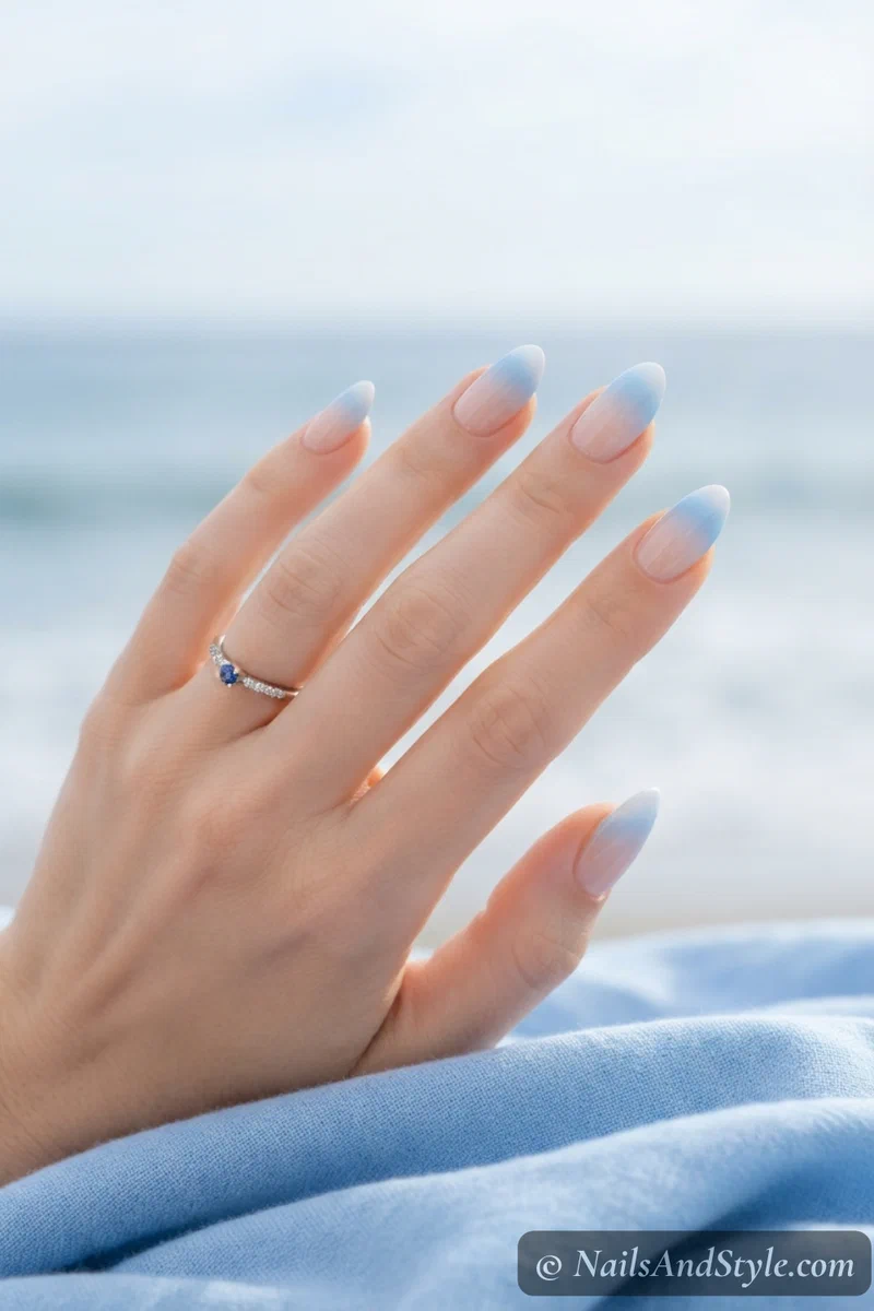 Soft blue to white ombre French bridal nails