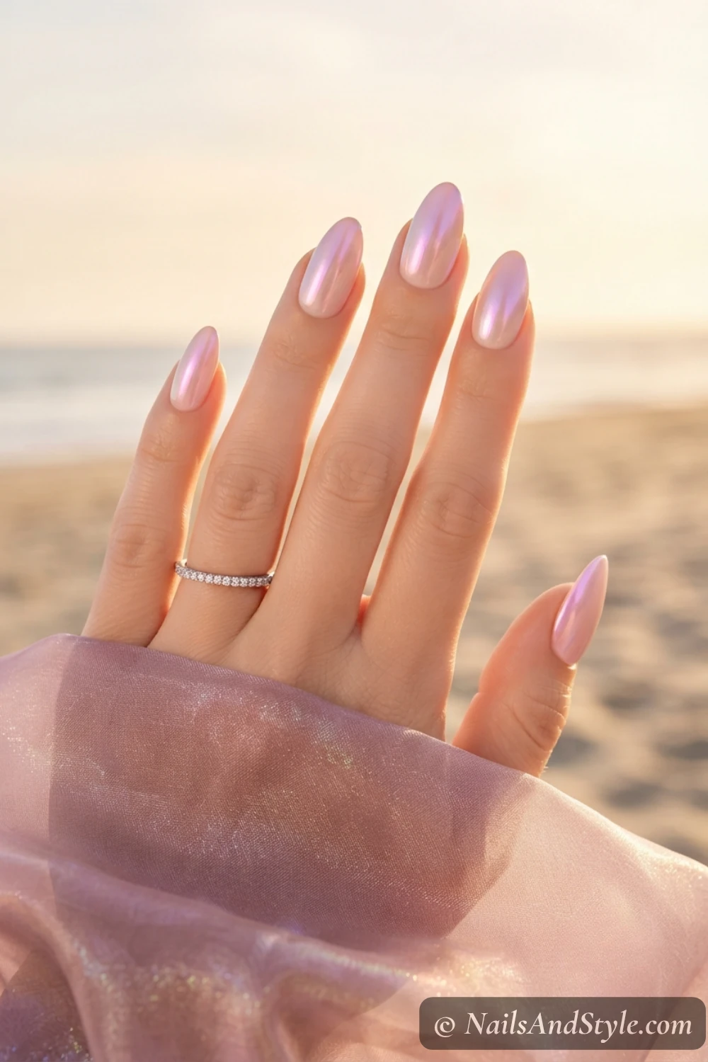 Blush nails with iridescent chrome ombre tips