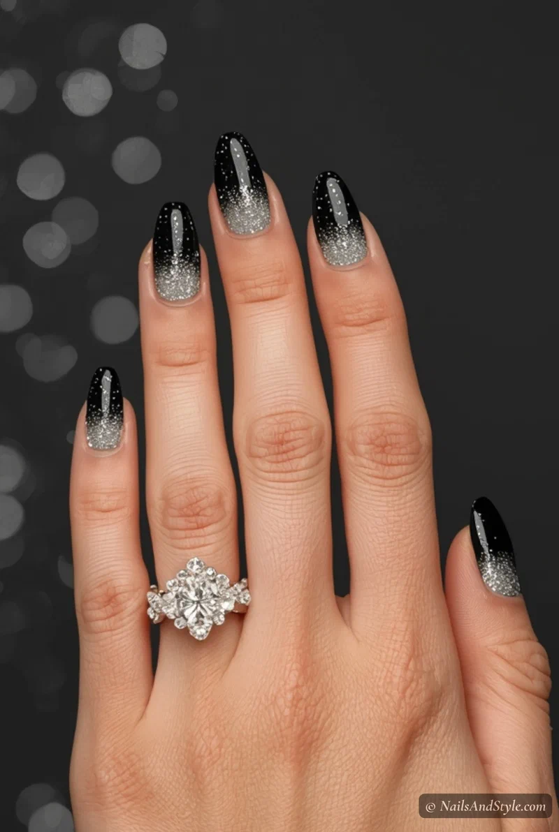 Black nails with silver glitter gradient tips for spring