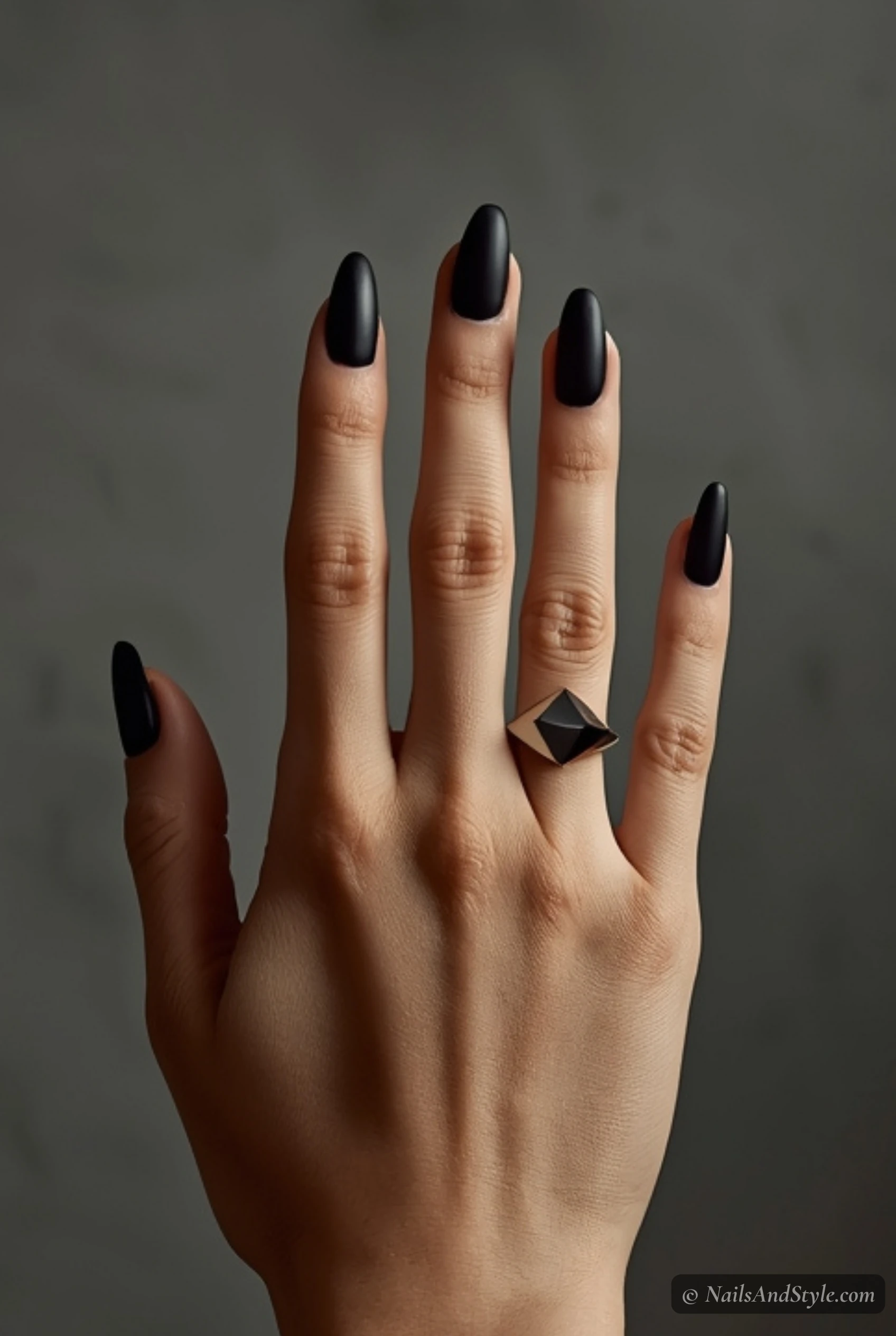 Matte black almond nails