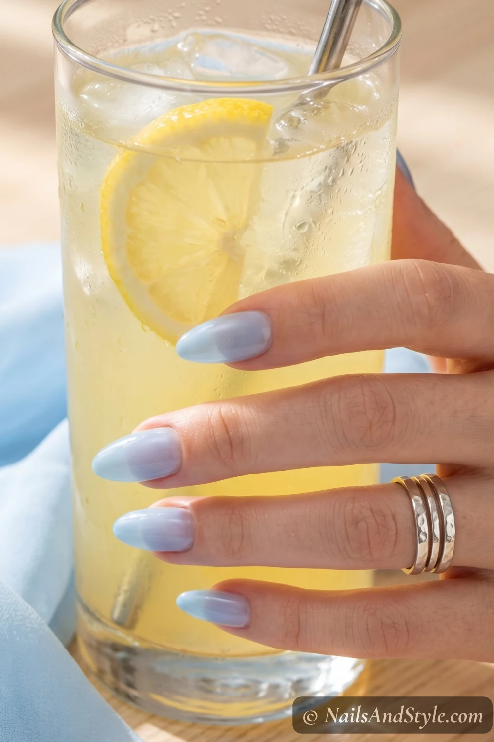 Sheer baby blue jelly nails with a squishy finish