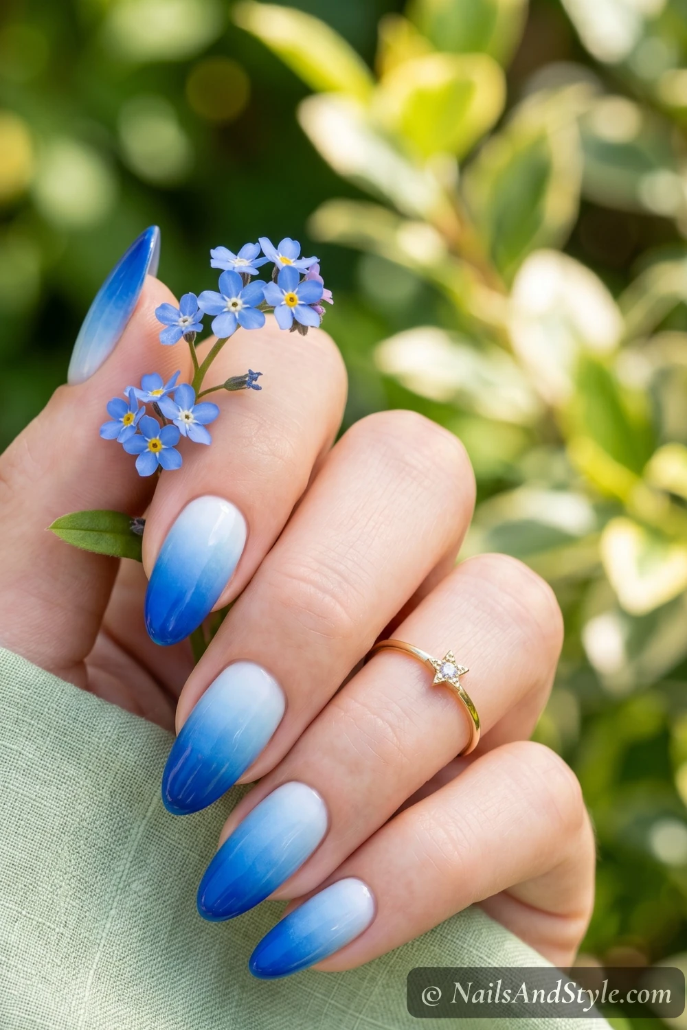 Blue ombre fade nails from white to deep blue