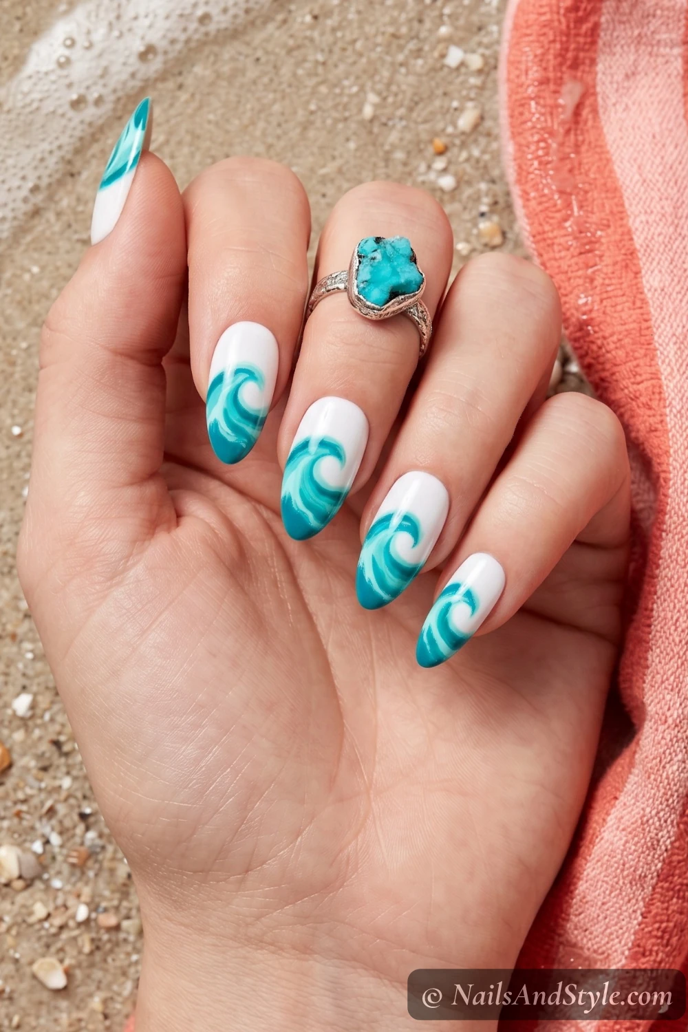 Turquoise nails with painted ocean waves