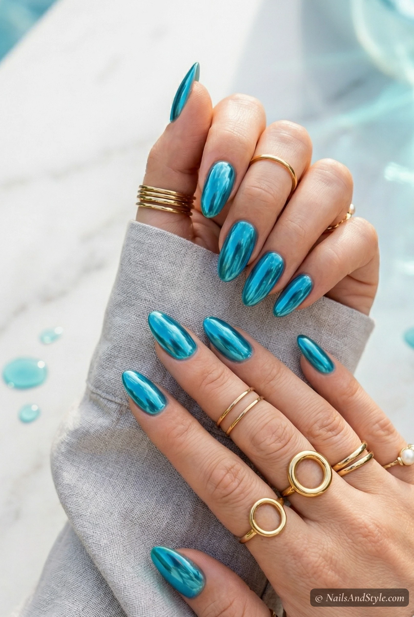 Aqua chrome nails
