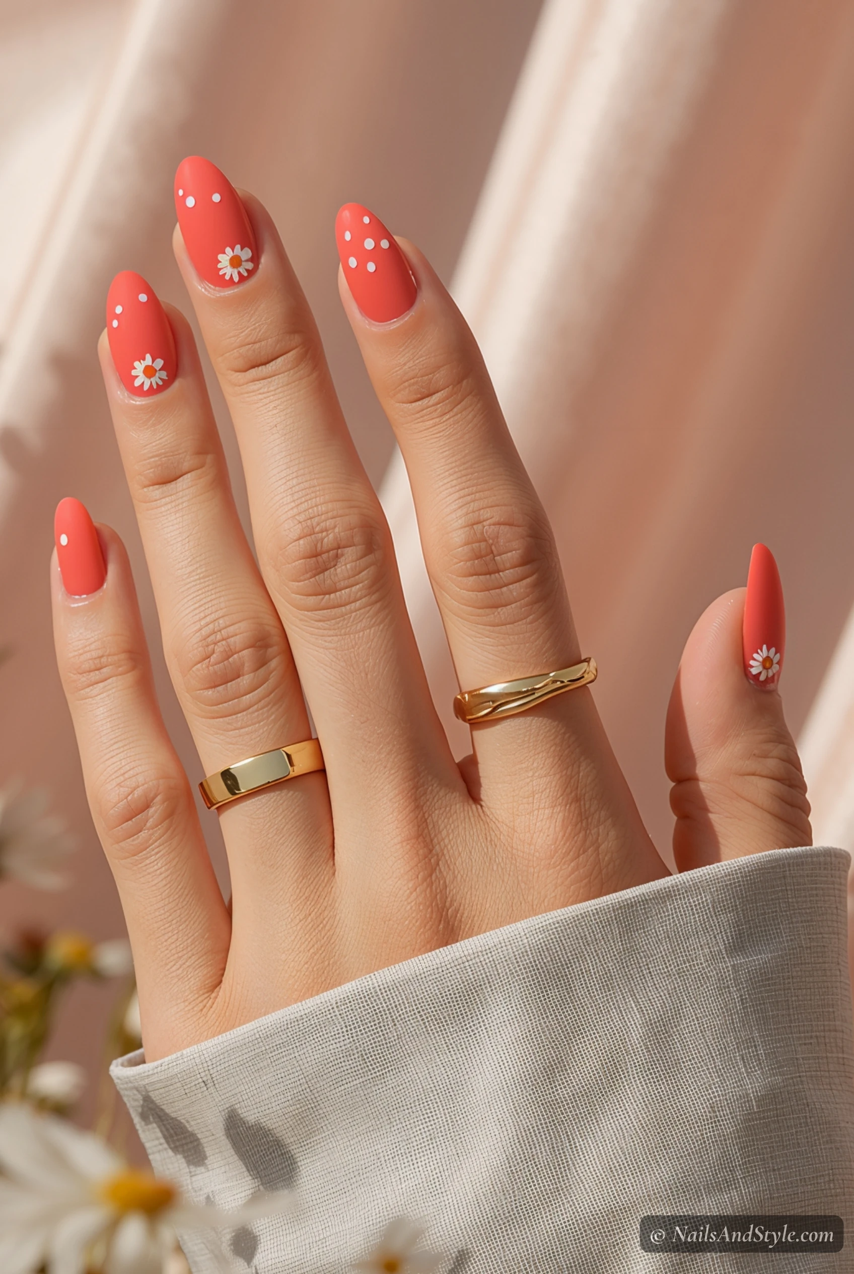 Coral nails with white daisies