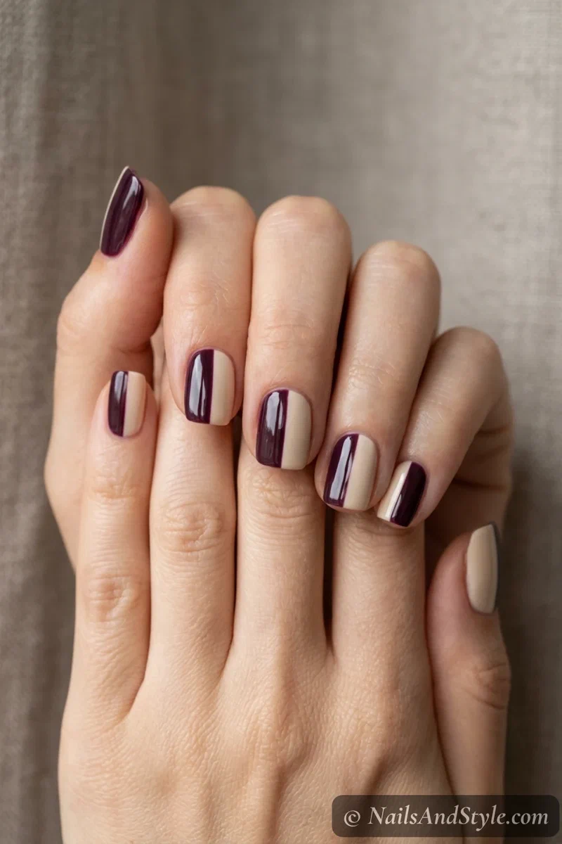 Plum and cream color block nails