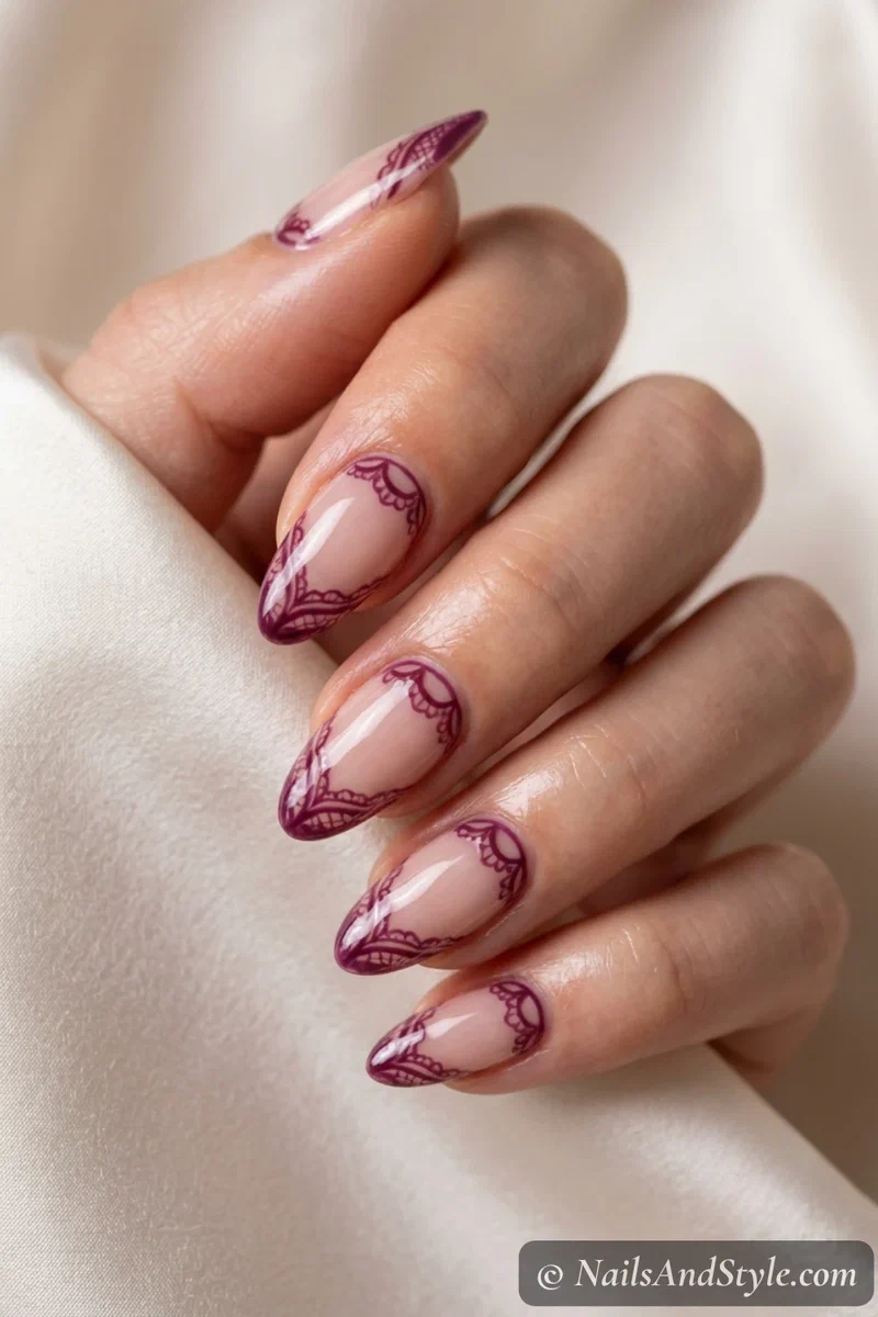 Sheer nails with delicate plum lace detail