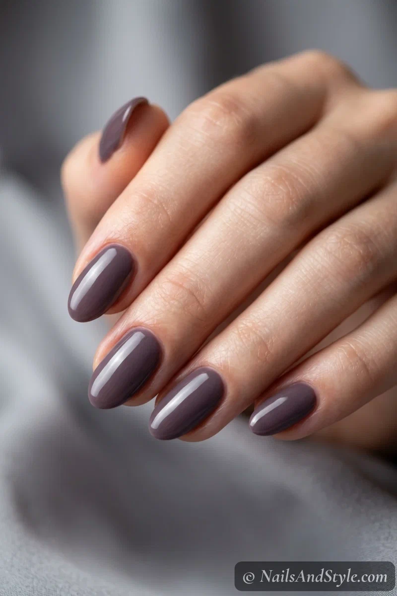 Smoky dusty grayed plum nails