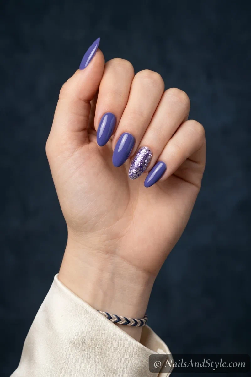 Blueberry nails with purple and silver glitter accent nail on medium almond nails