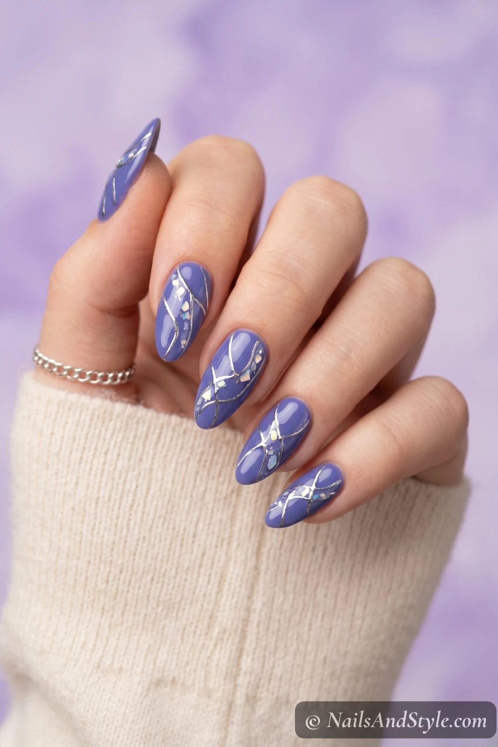 Creamy blueberry purple nails with a glossy finish