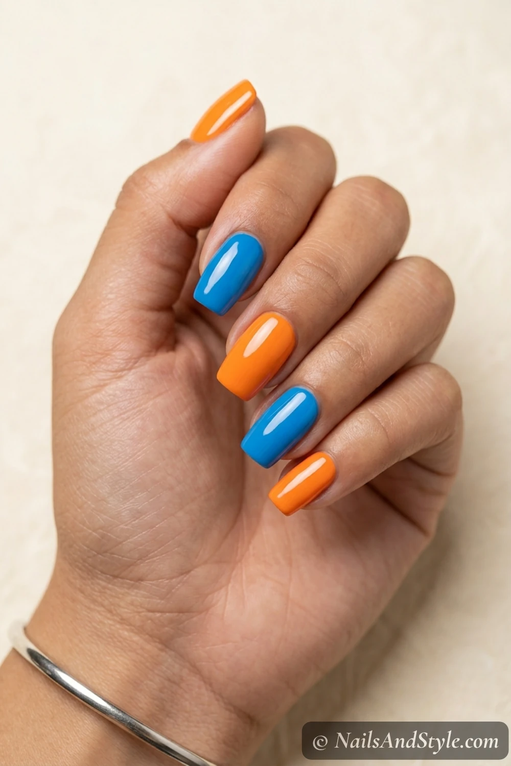 Orange and blue color block nails