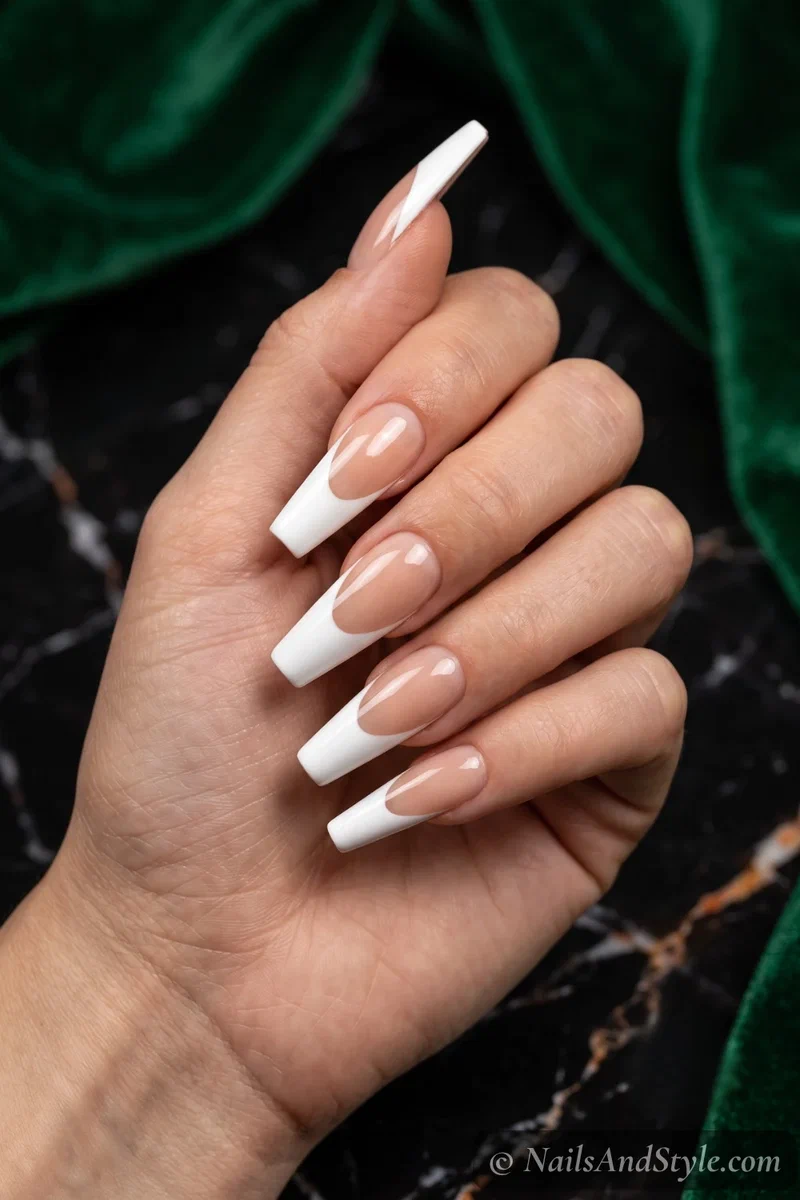 Coffin-shaped nails with bold white French tips