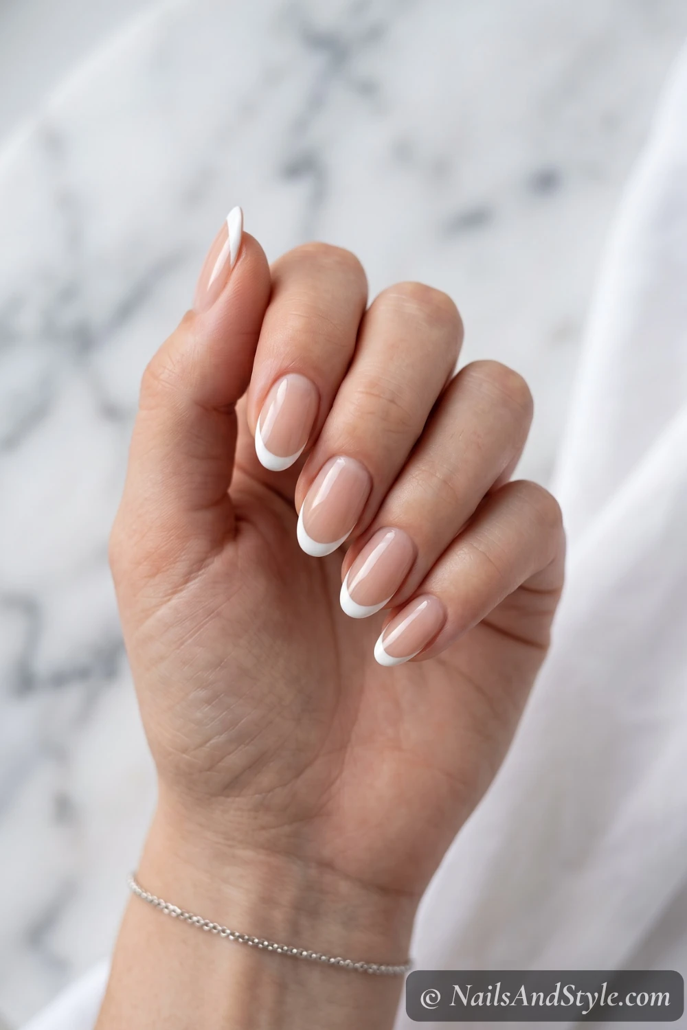 Crisp white French tip nails