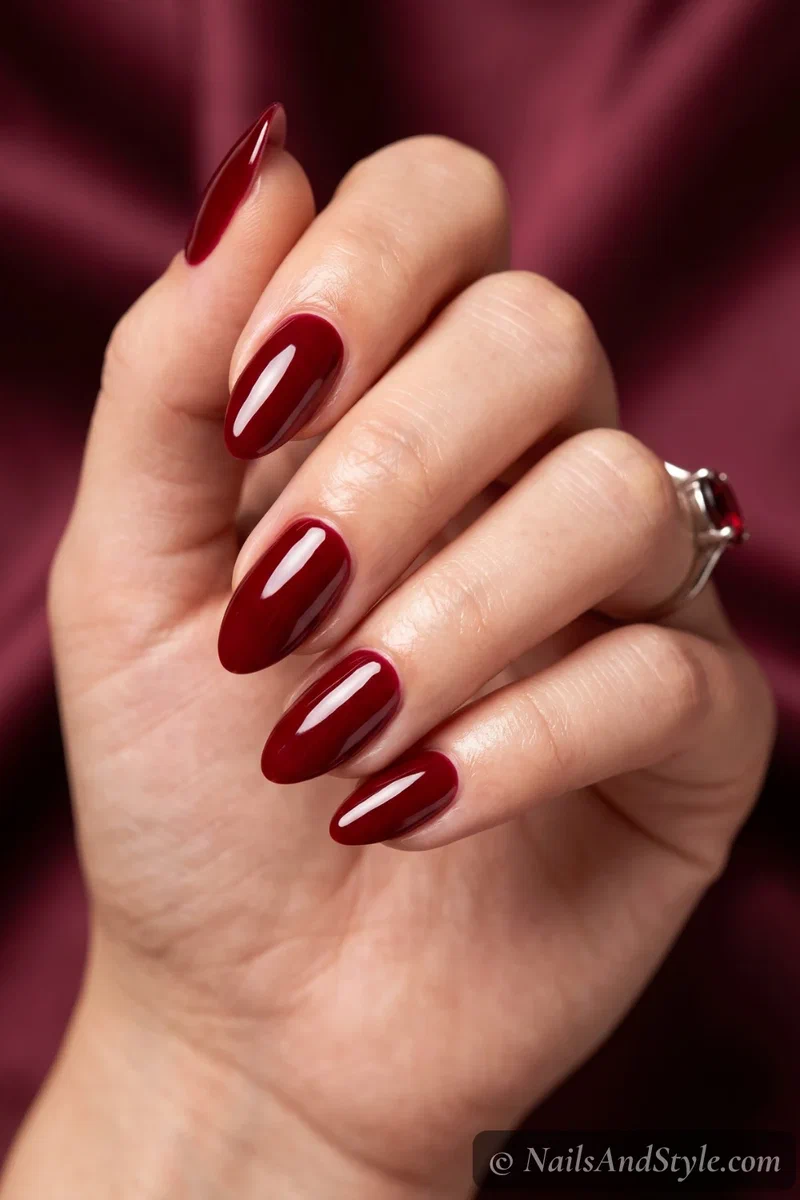 Deep glossy blood red nails