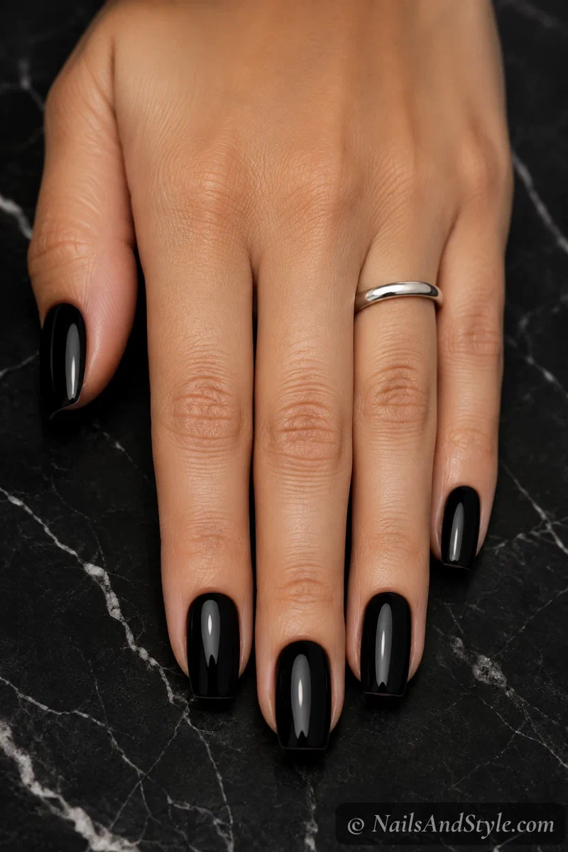 Sleek glossy jet black nails