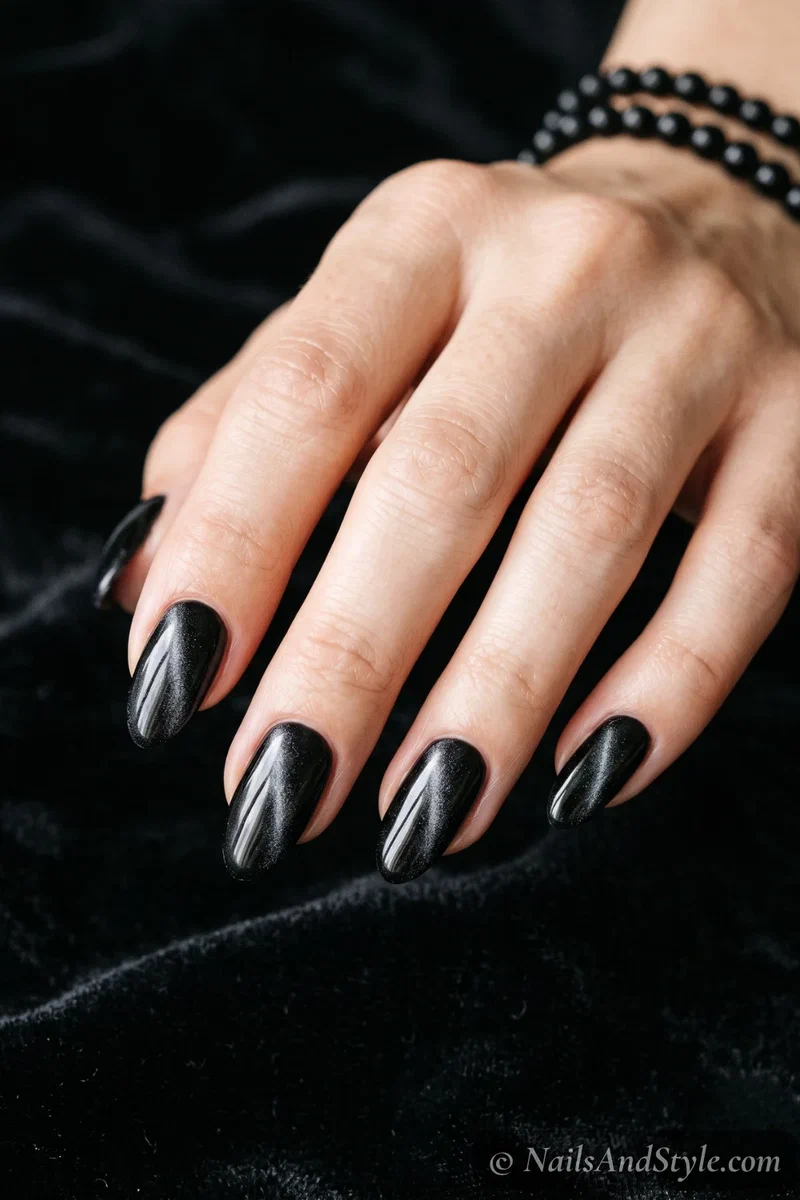 Black magnetic velvet nails with a soft shifting shimmer