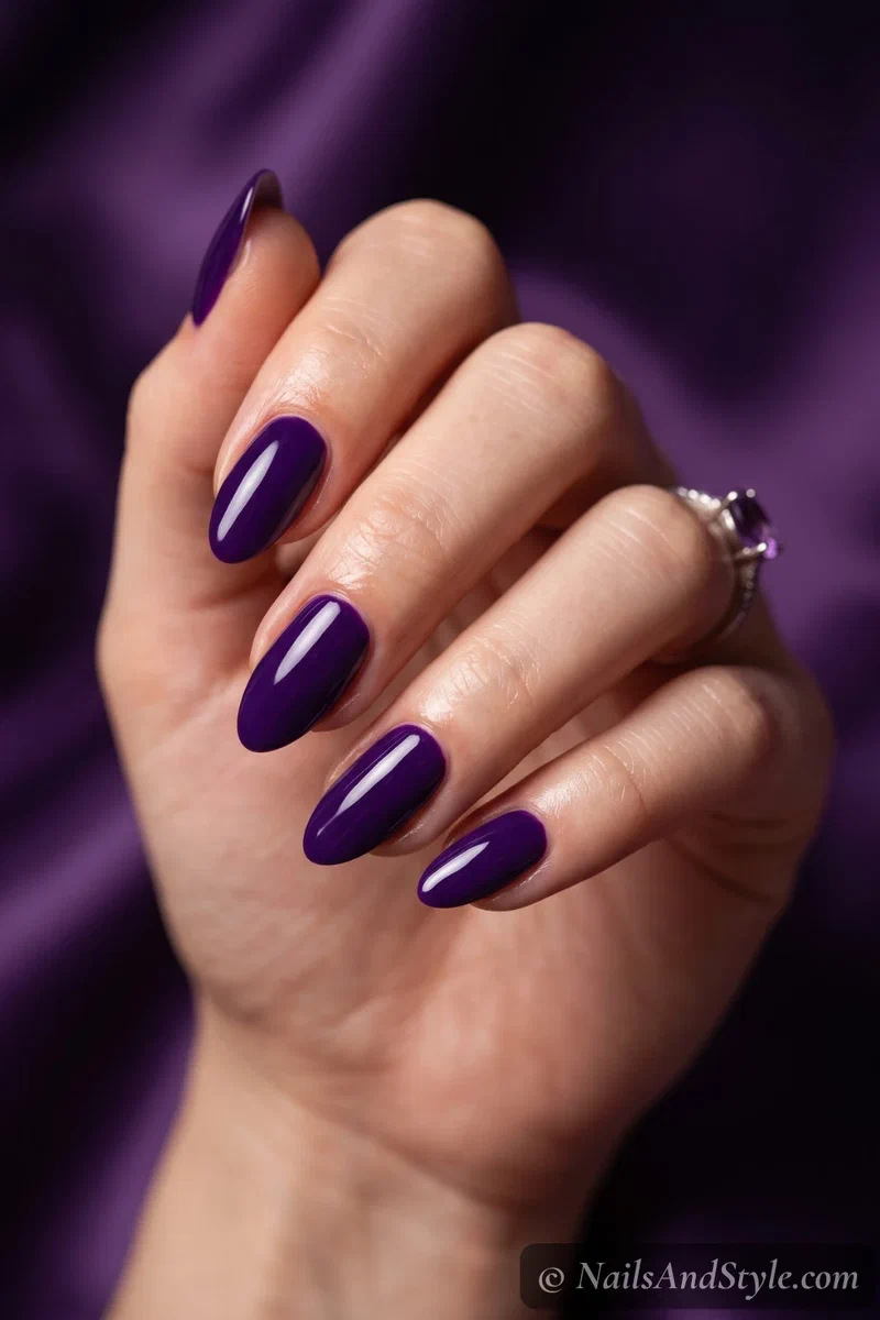 Deep glossy royal purple nails