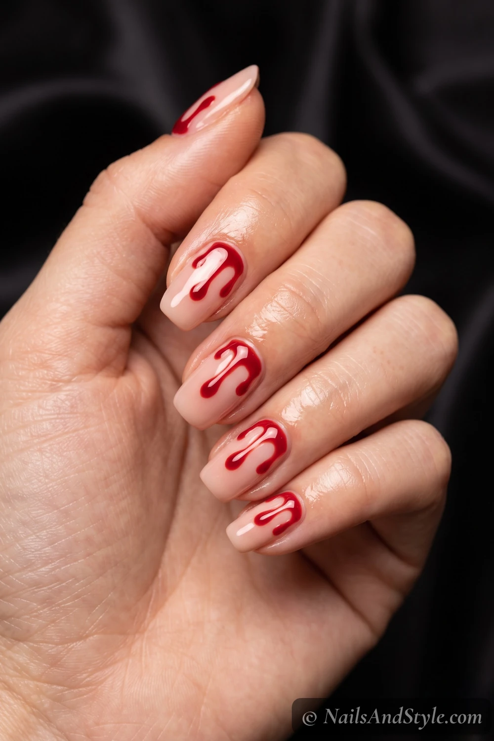 Glossy blood drip nails
