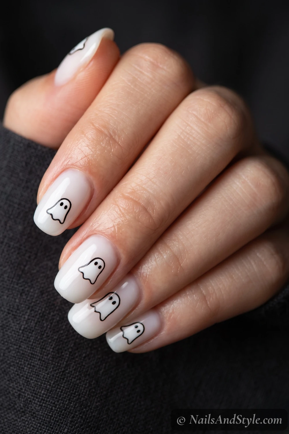 Milky white nails with cute ghost decals
