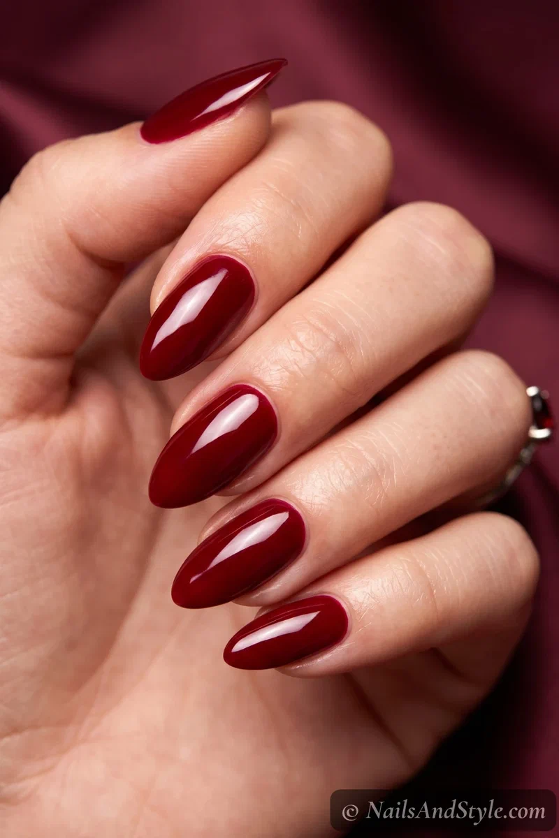 Almond nails in deep glossy blood red