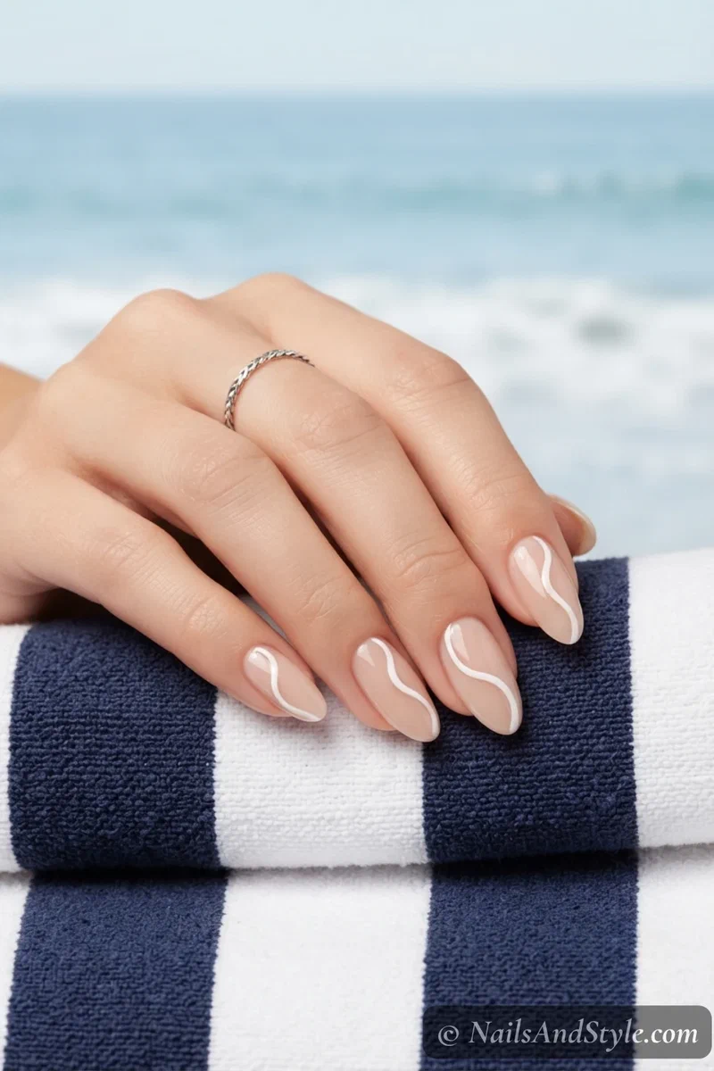 Nude nails with one white wave line on each nail