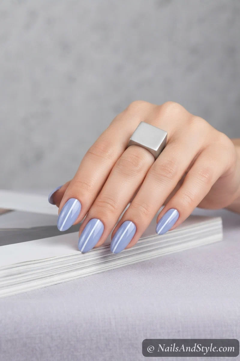 Periwinkle nails with thin white center stripe