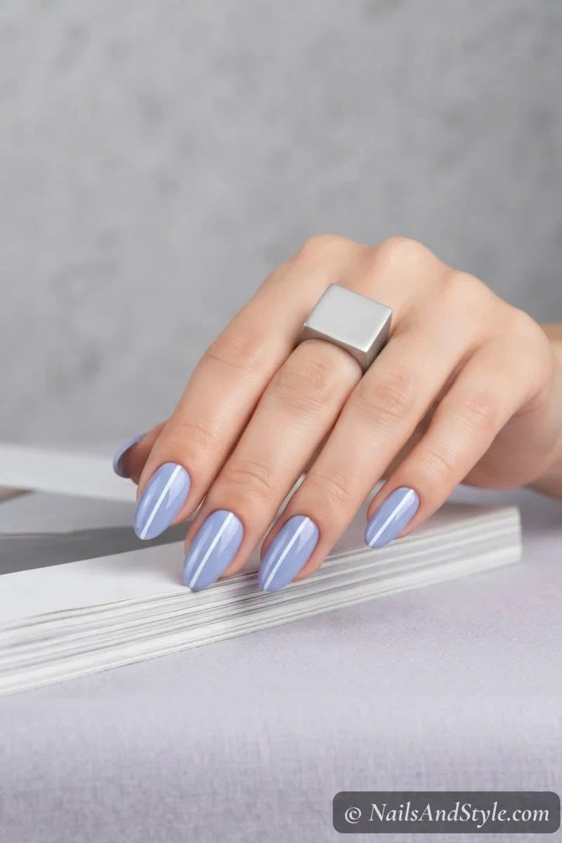 Periwinkle nails with thin white center stripe