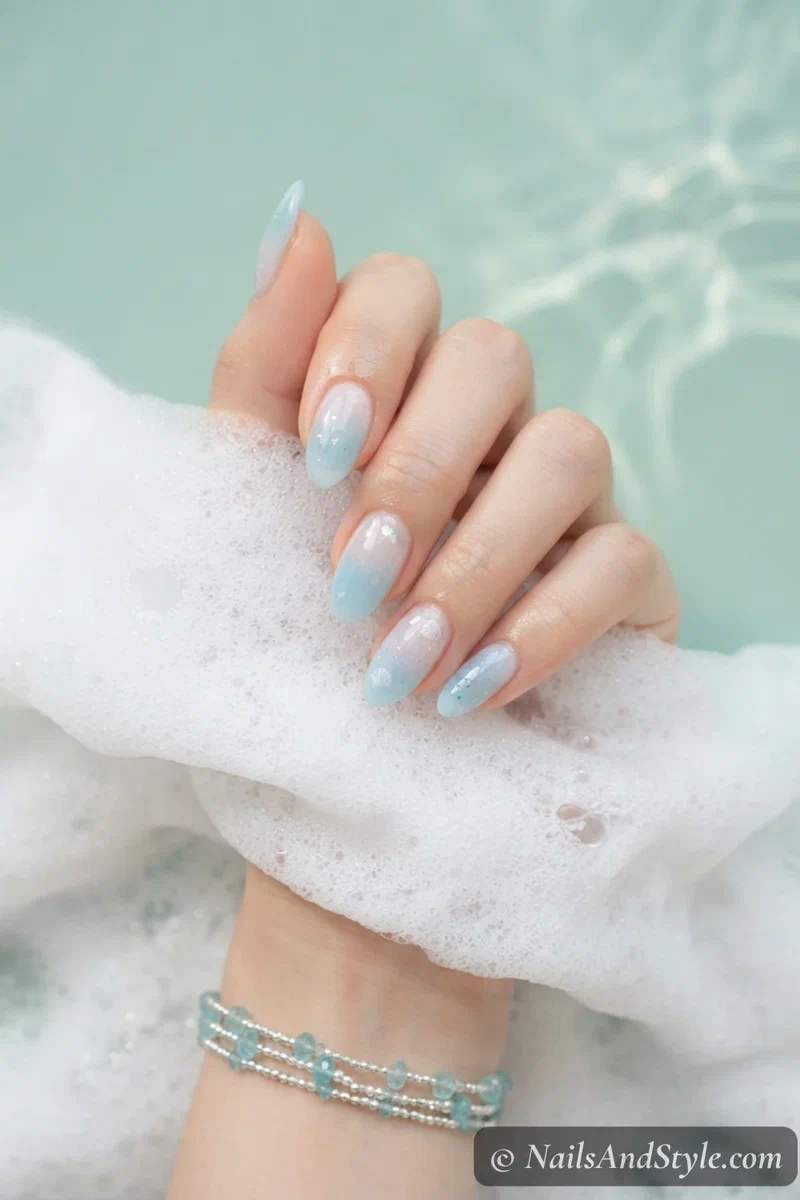 Sea foam aqua to white ombre nails