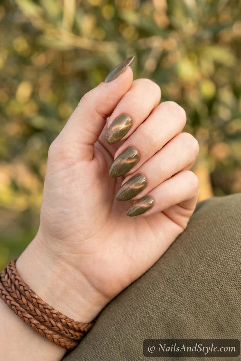 Olive green cat eye nails with bronze shimmer flash