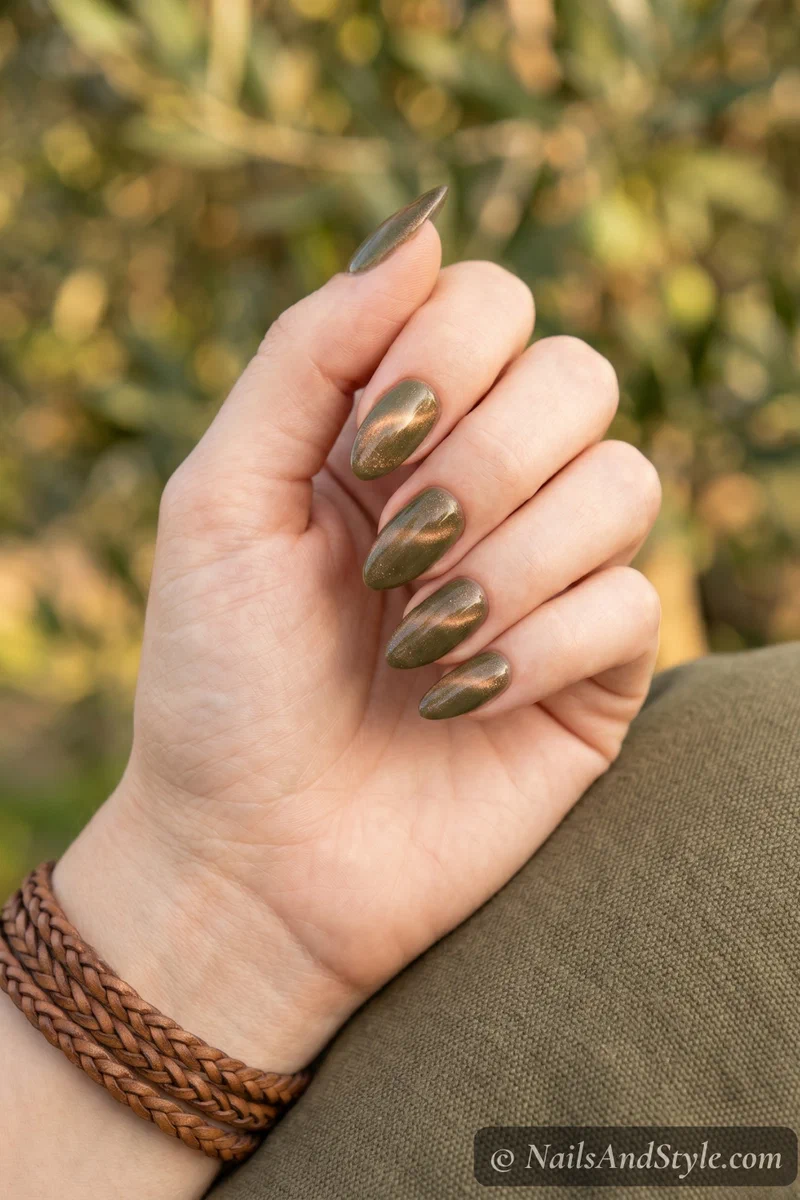 Olive green cat eye nails with bronze shimmer flash