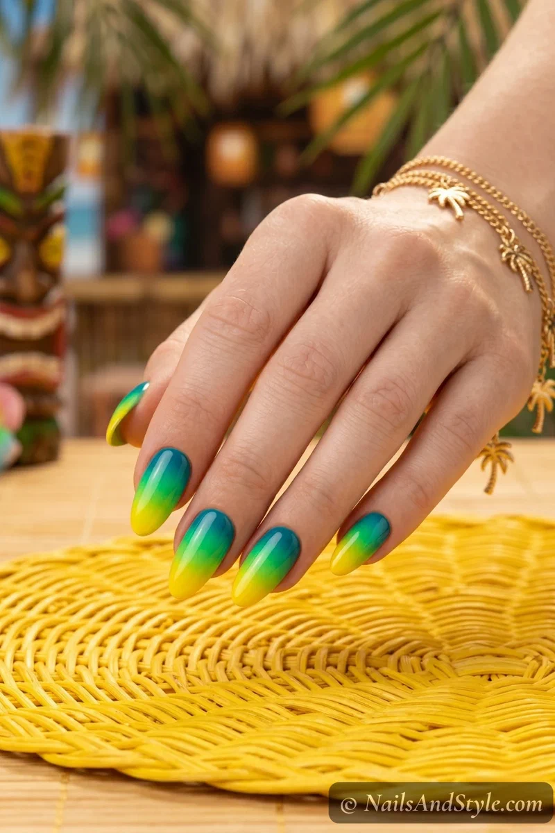 Tropical teal to yellow bold ombre on medium almond nails