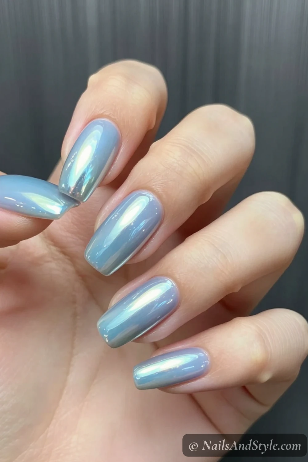 Icy pale blue mirror chrome nails