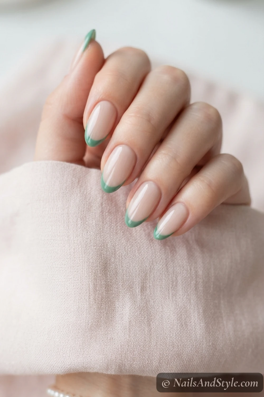 Jade green French tip nails