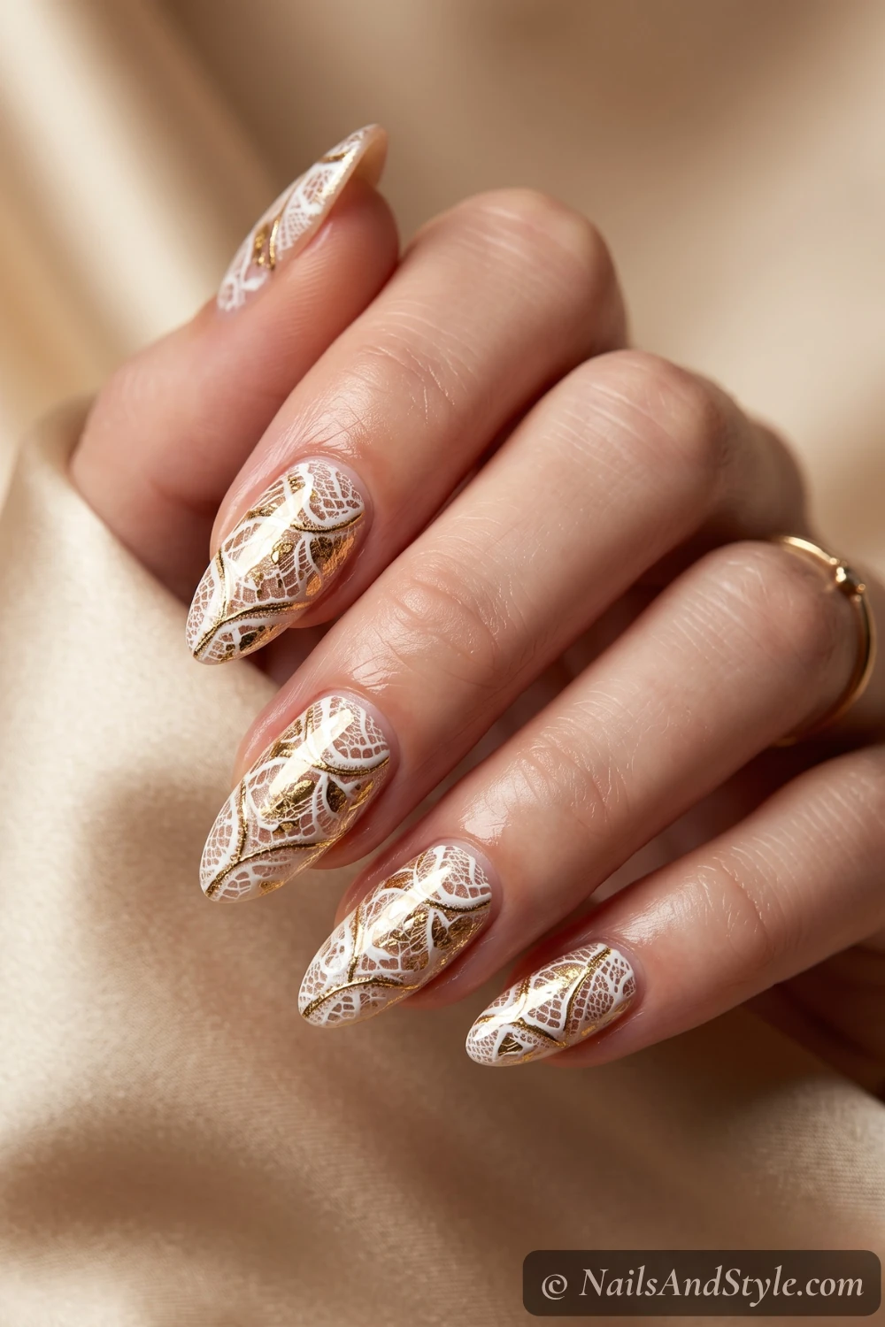 Gold and white lace nails