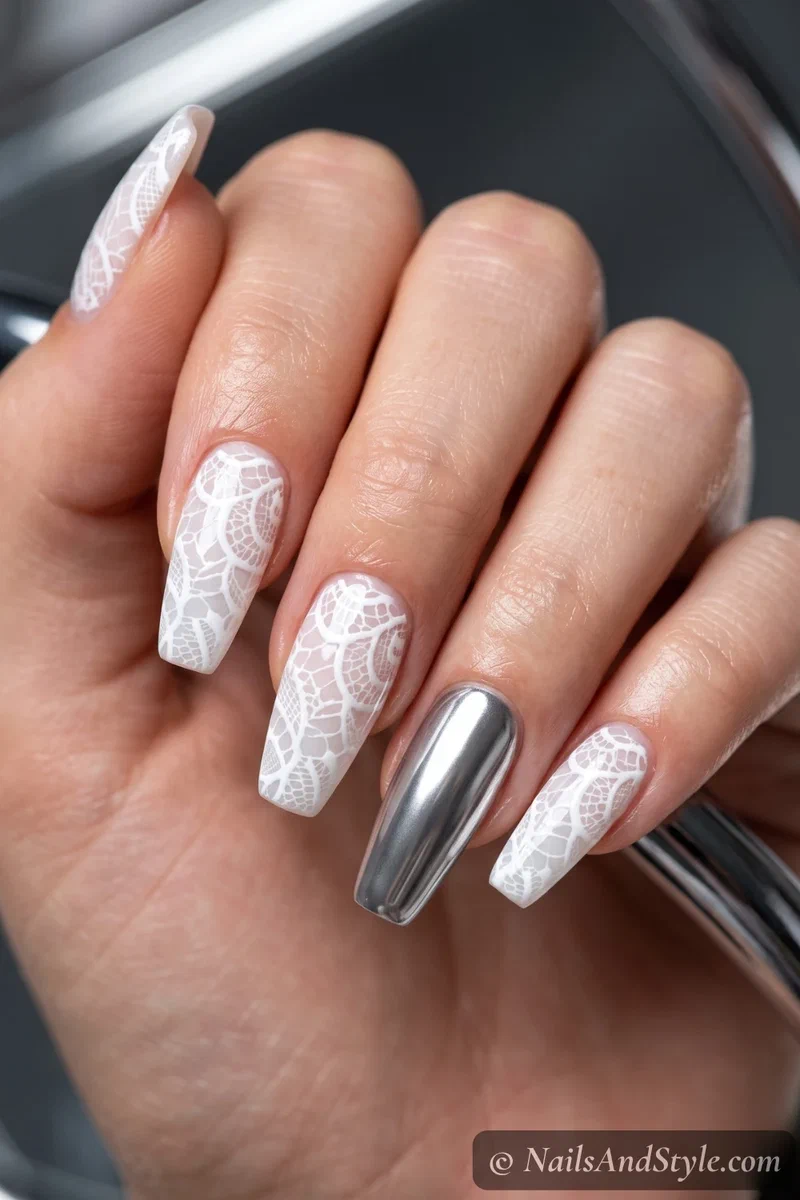 Lace nails with a chrome accent nail
