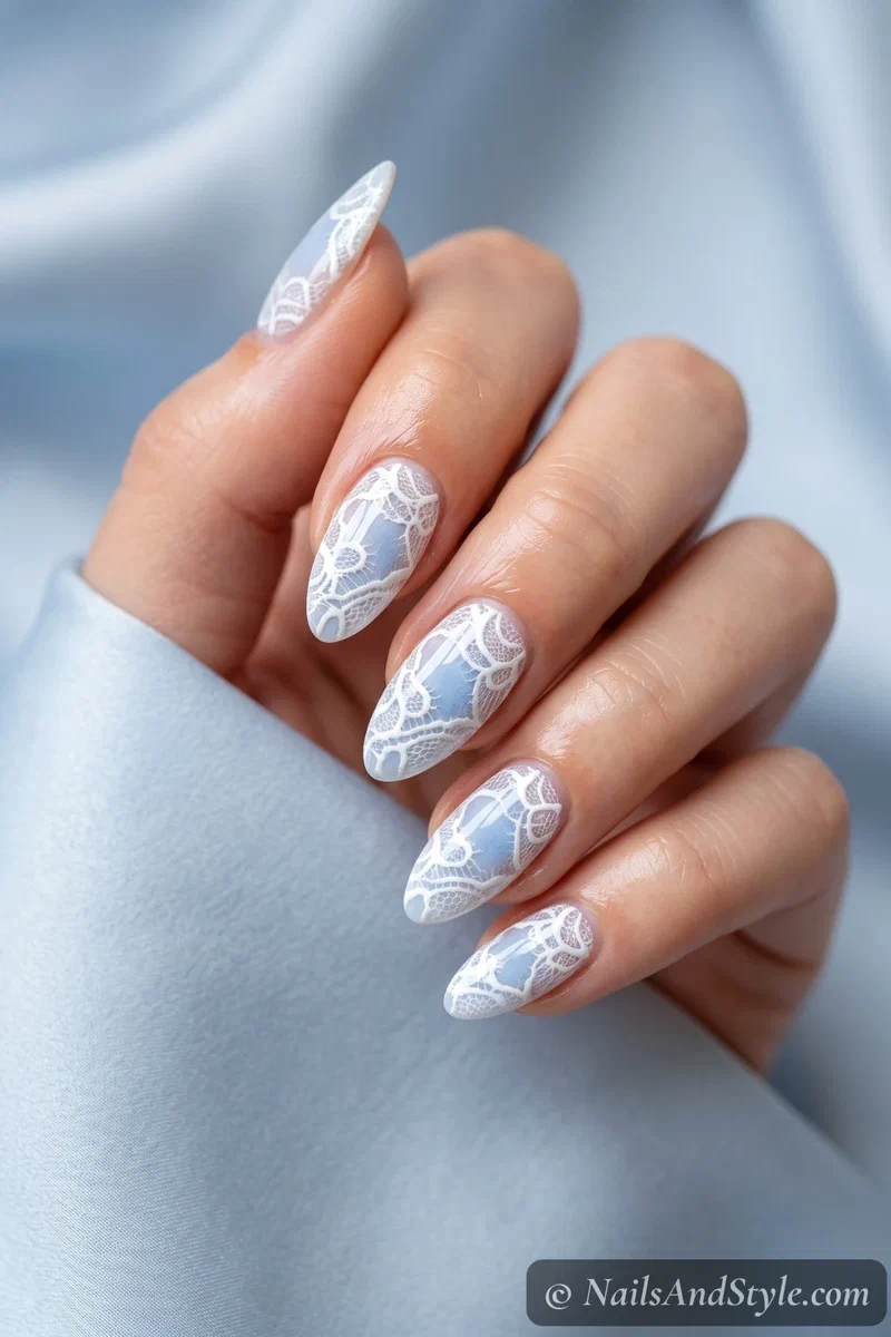 White lace nails with powder blue accent