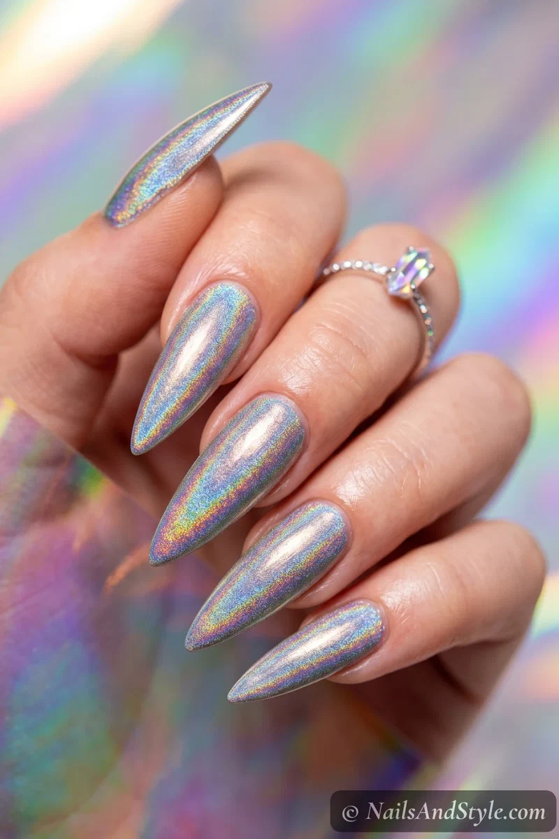 Long stiletto nails in a rainbow holographic finish