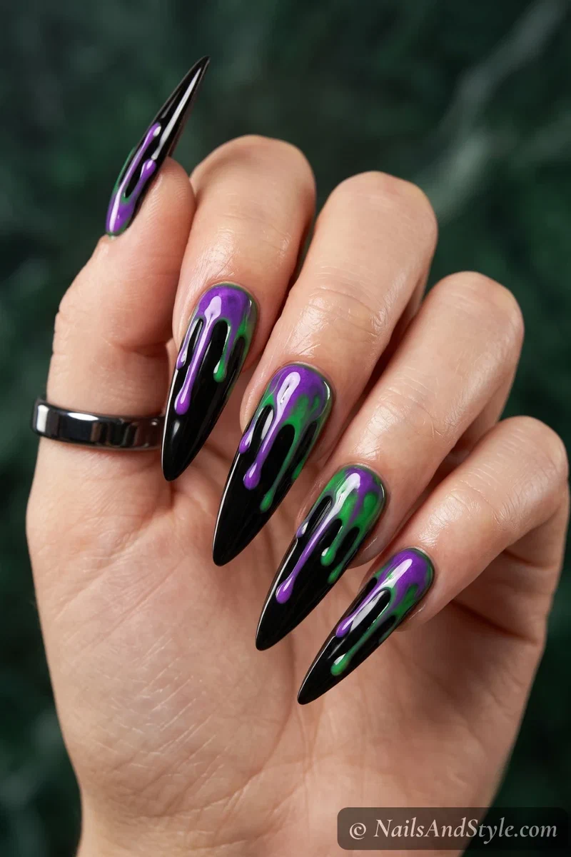 Long black nails with purple and green toxic ooze dripping