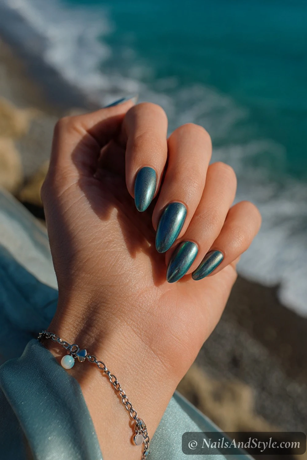 Teal chrome mermaid nails