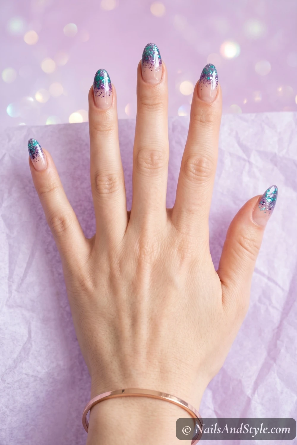 Teal and purple glitter gradient nails