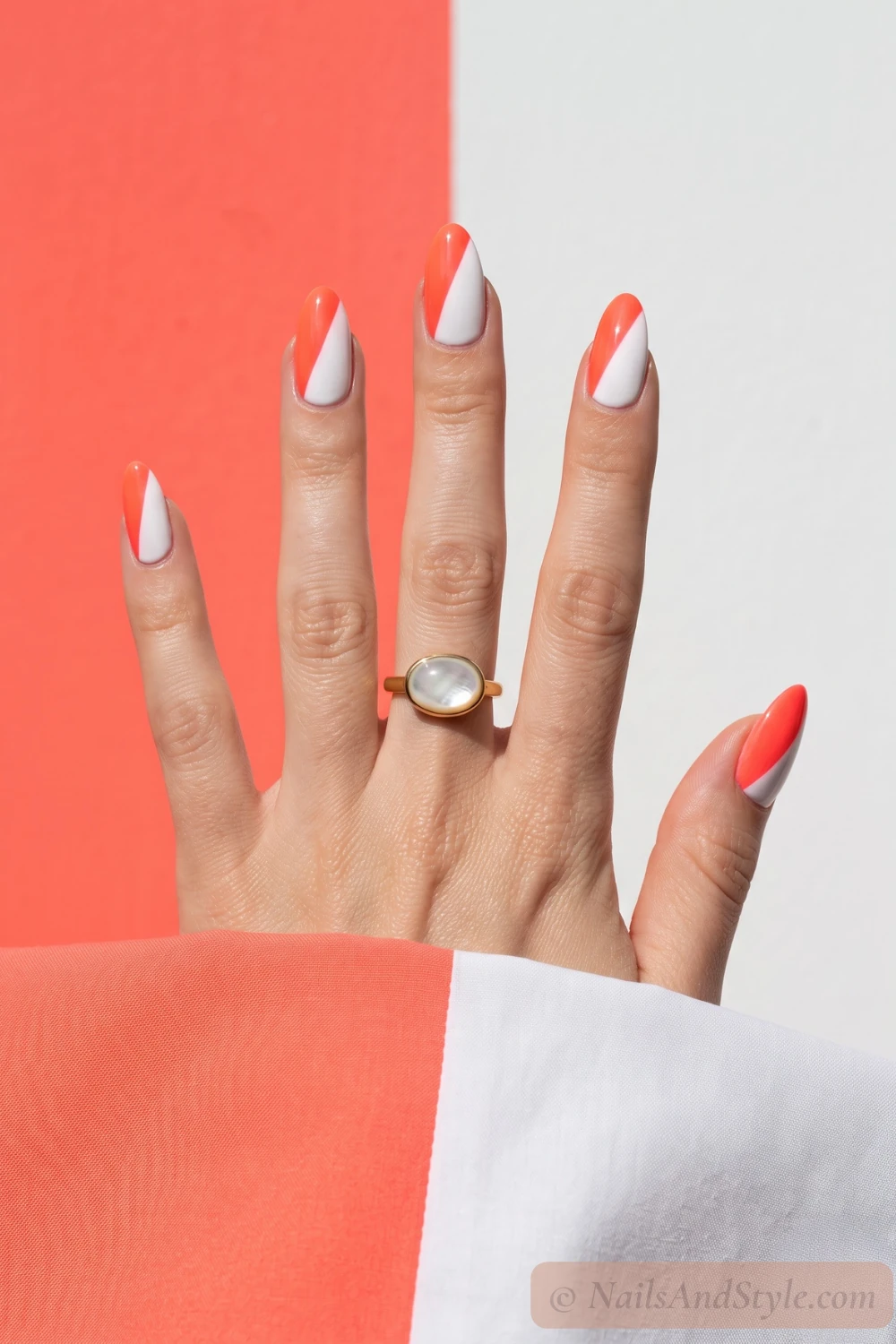 Coral and white color block nails