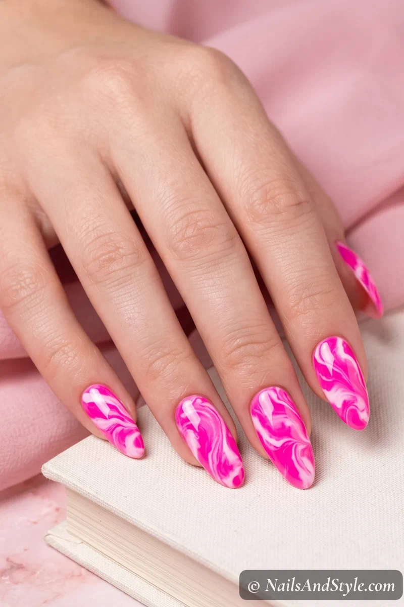 Electric pink and white marble nails