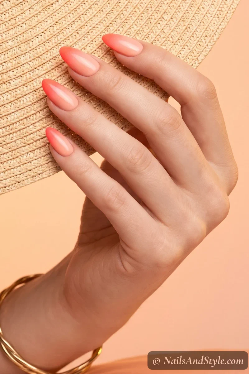 Peach to neon coral gradient nails