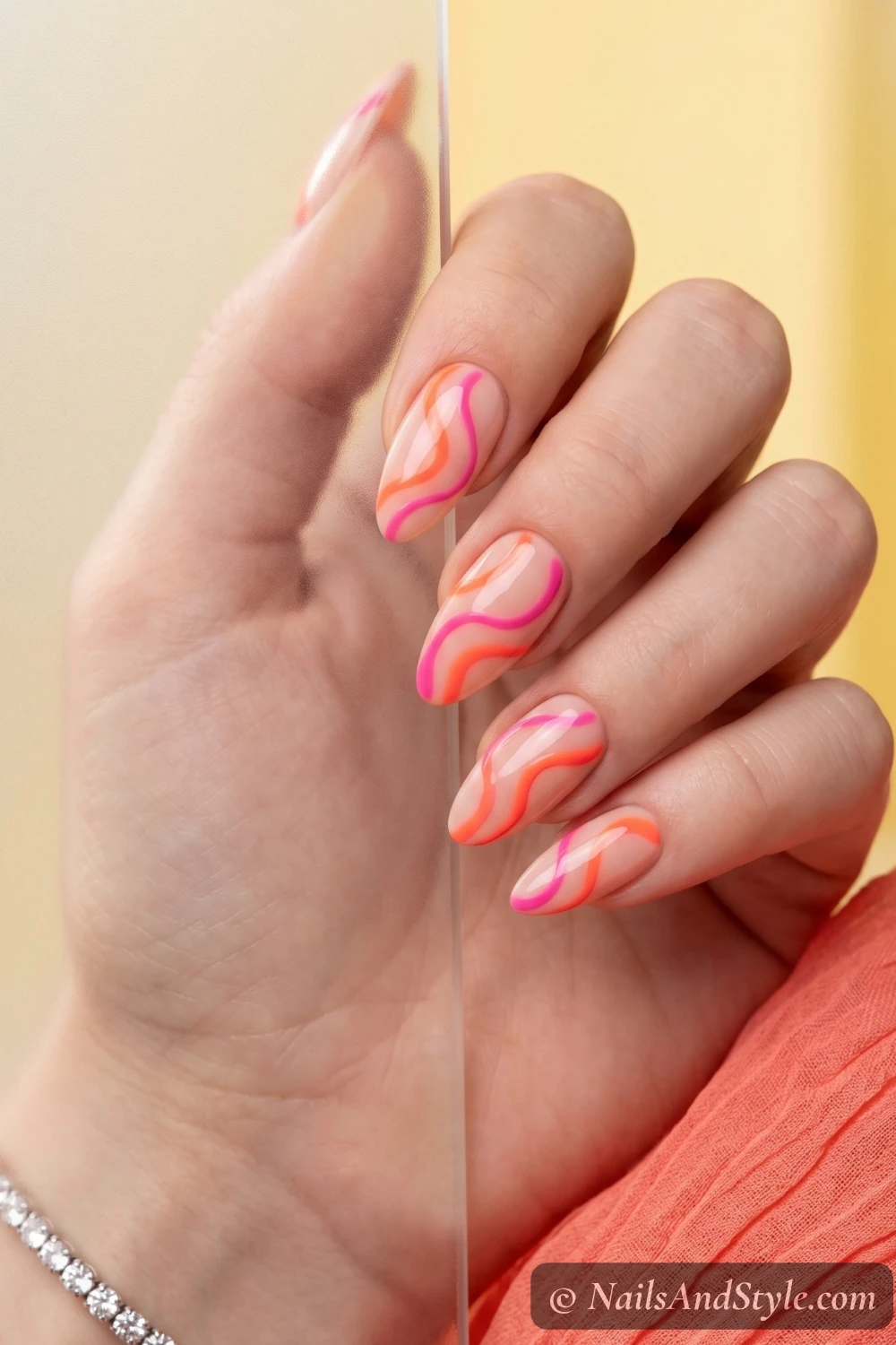 Neon coral swirl nails