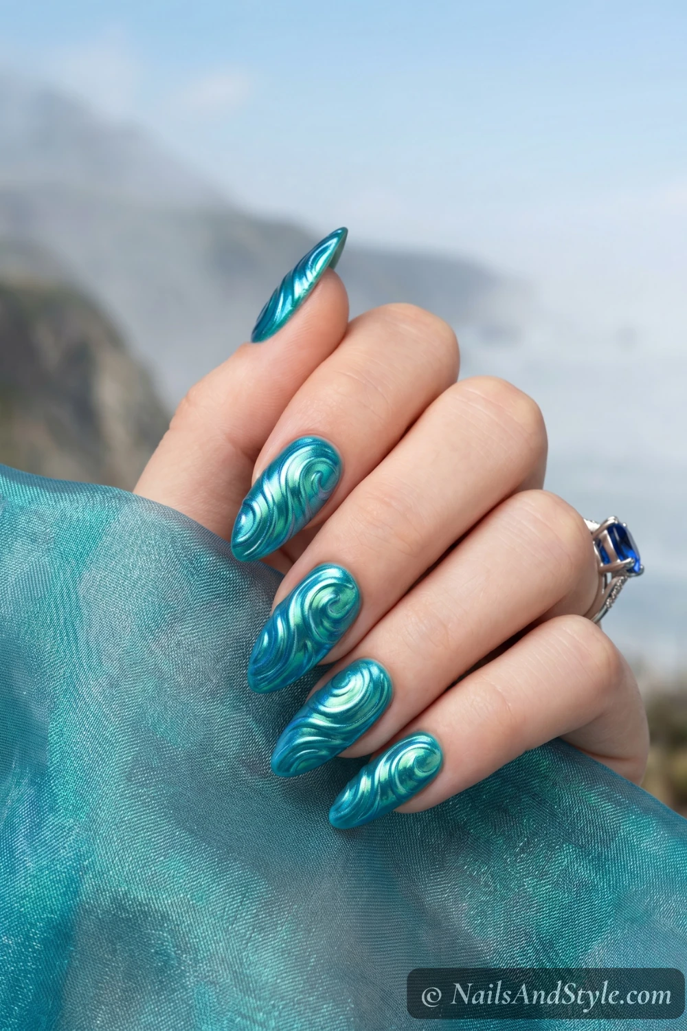 Teal ocean chrome swirl nails